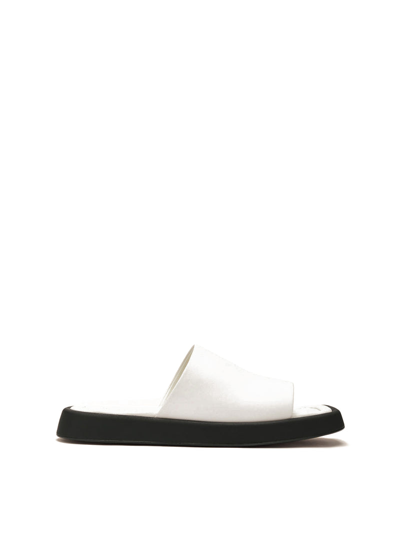 Barca vanilla sandal with single strap and thick black outsole.