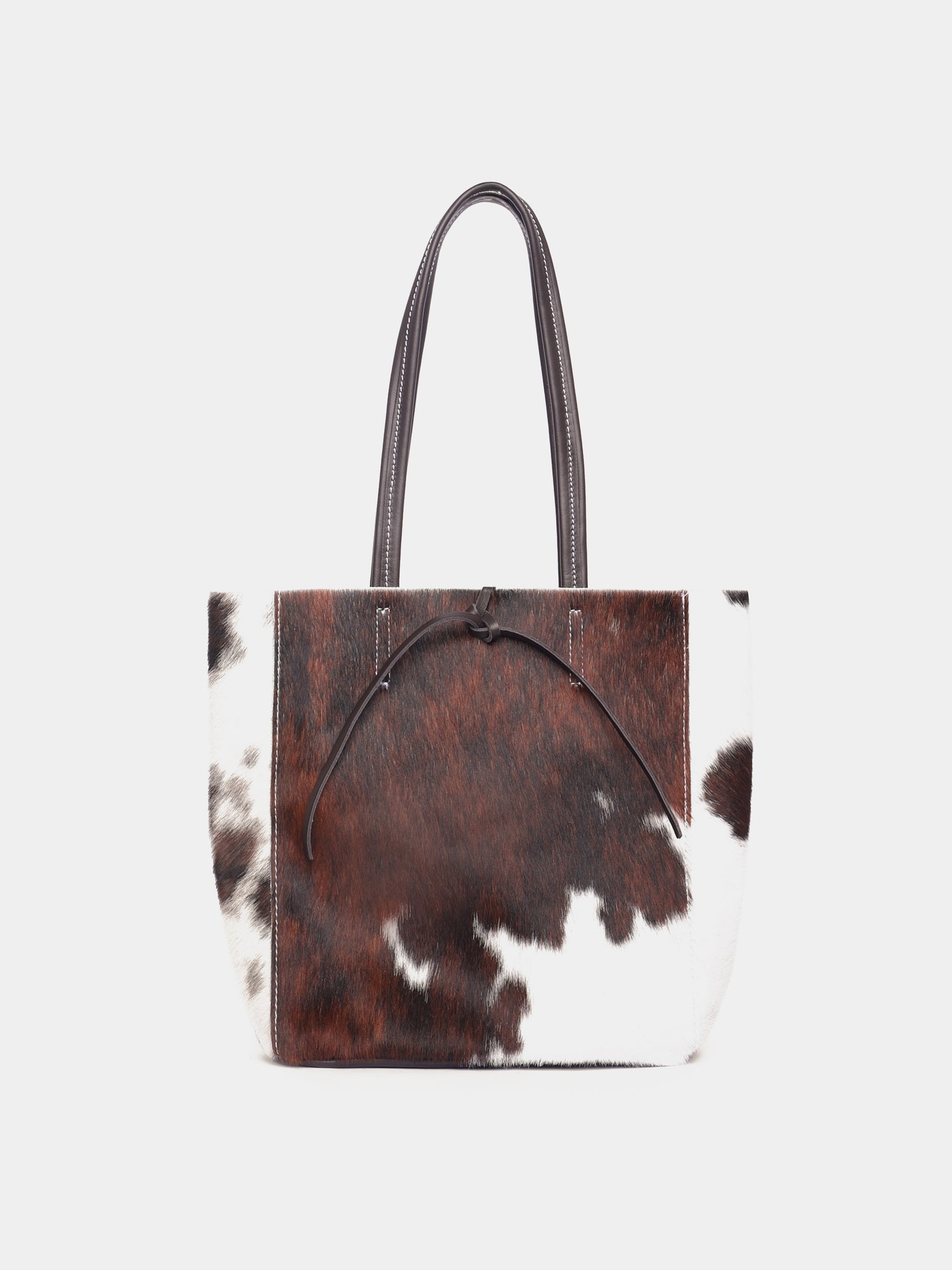 Medium cow print pony hair and leather tote bag