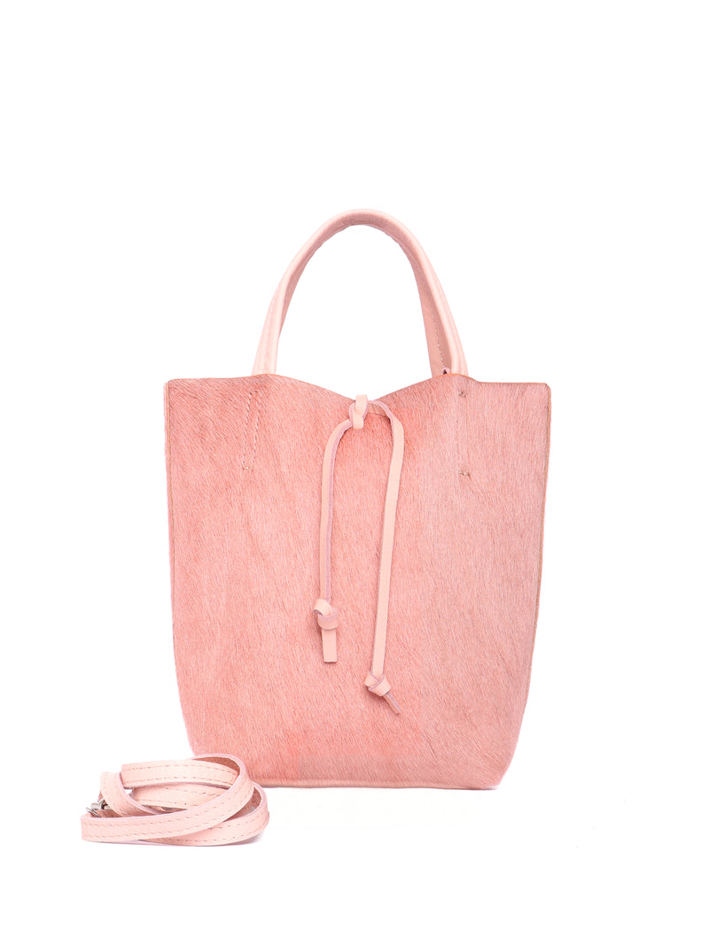 Pink pony hair mini leather tote bag with a crossbody strap