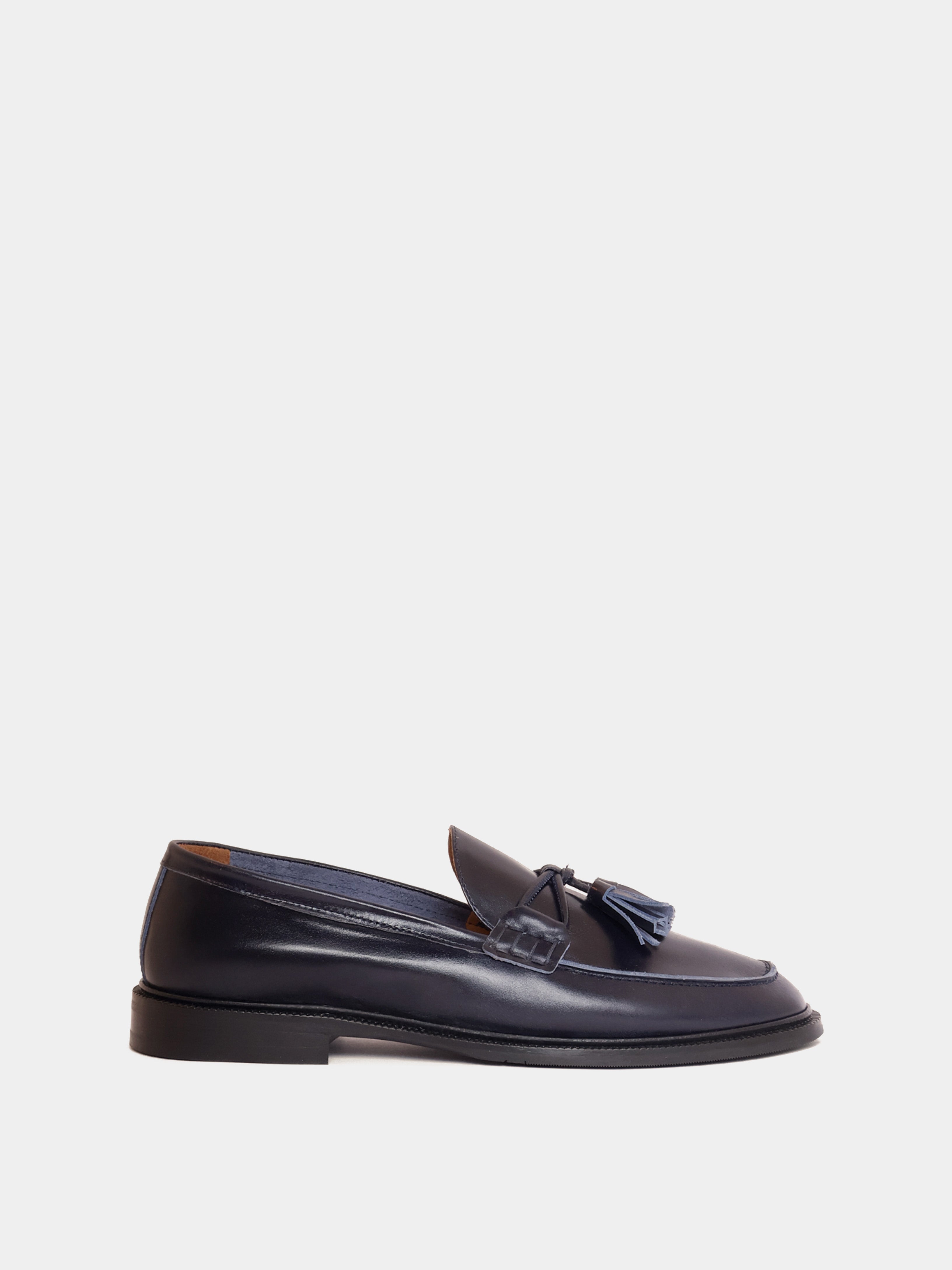 Navy loafer with pompom, side view