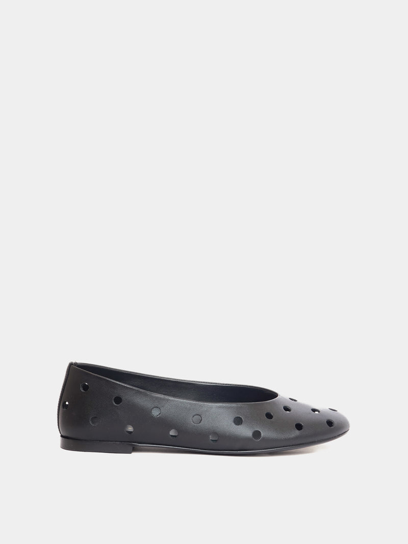black ballet flat with round cutouts