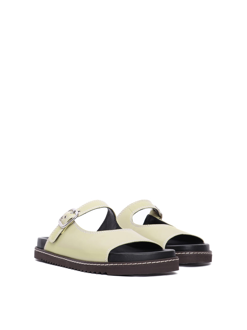 Madeira pistachio sandals with adjustable buckle straps and flat soles.