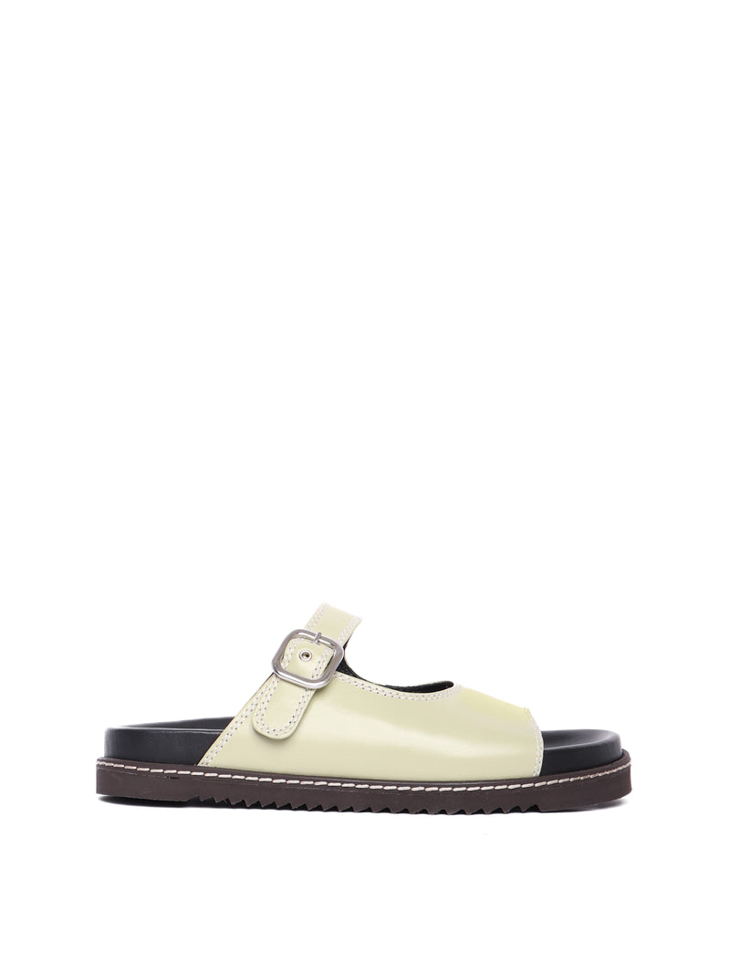 Madeira pistachio sandals with adjustable buckle straps and flat soles.