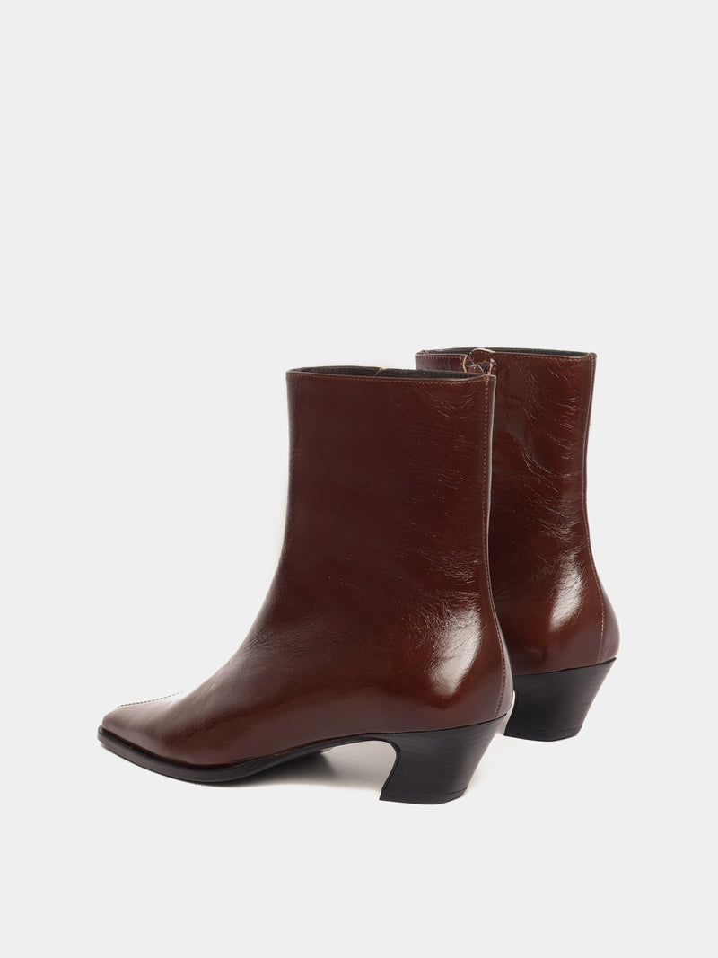 Brown leather ankle boots with a pointed toe