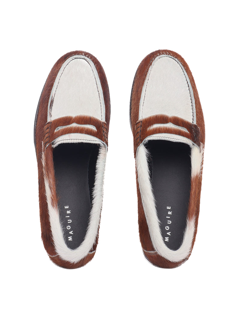 Napoli loafer with cow-print pony hair and black sole, top view.