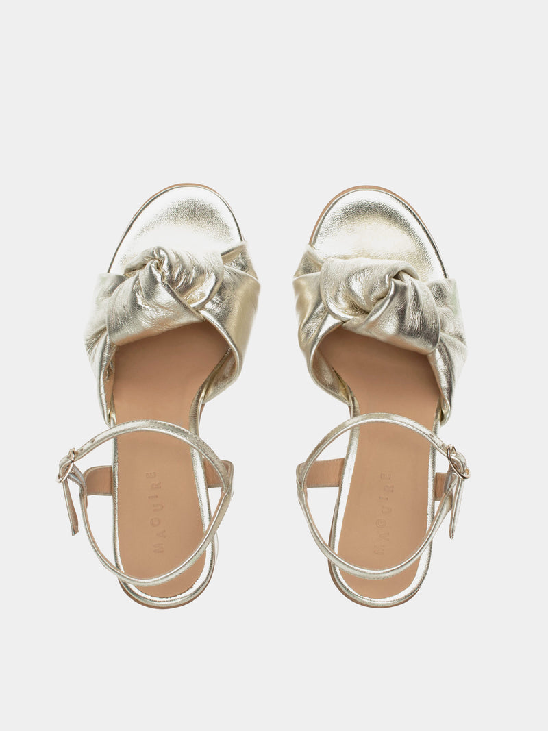 Gold metallic ankle strap heel with knotted upper