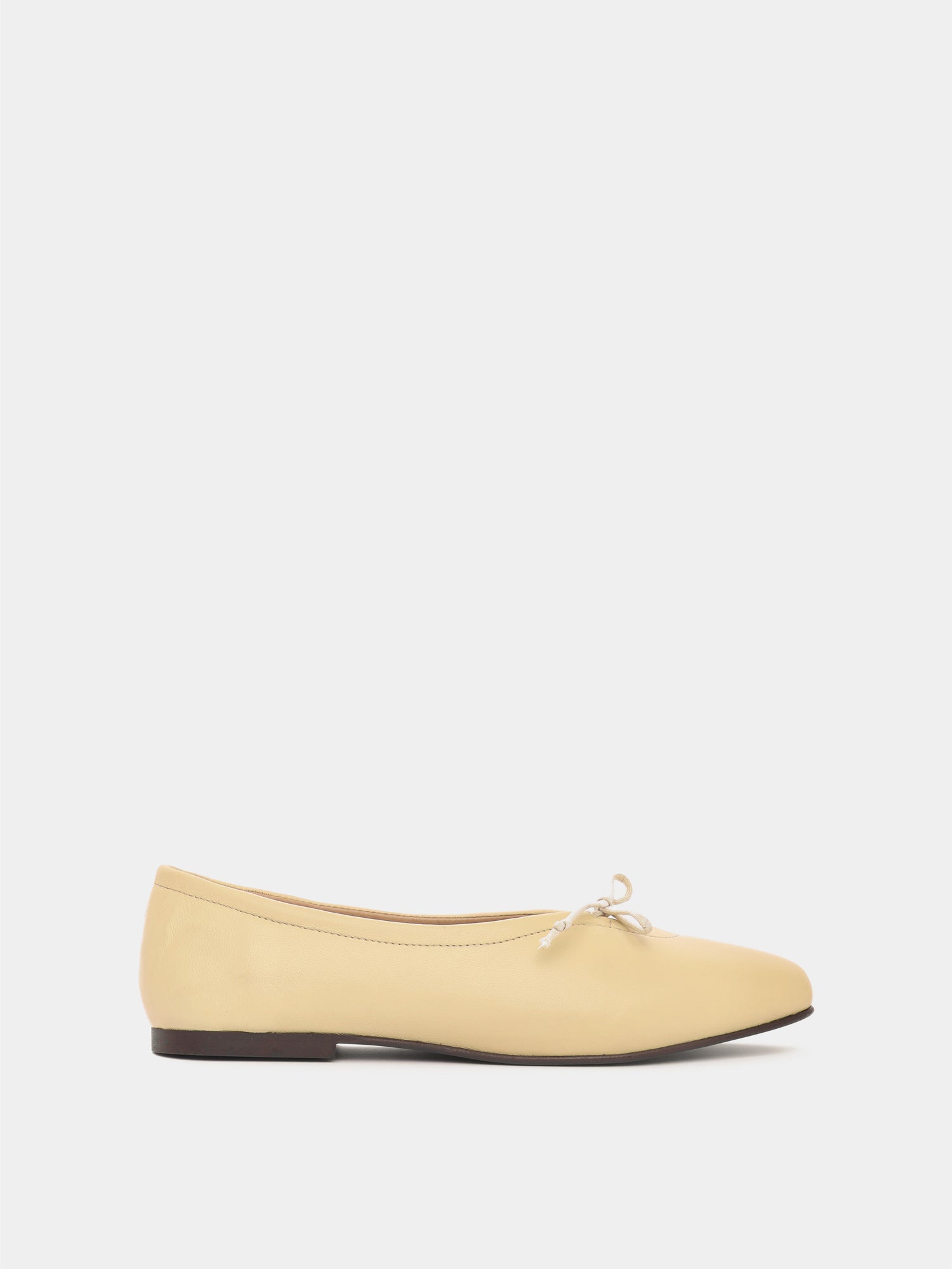 Butter leather ballerina flat with a butter bow