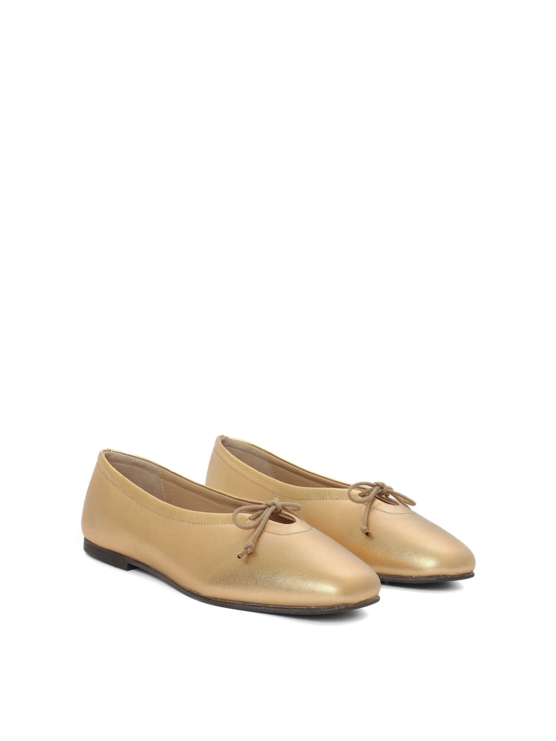 Gold leather ballerina flats with a gold bow
