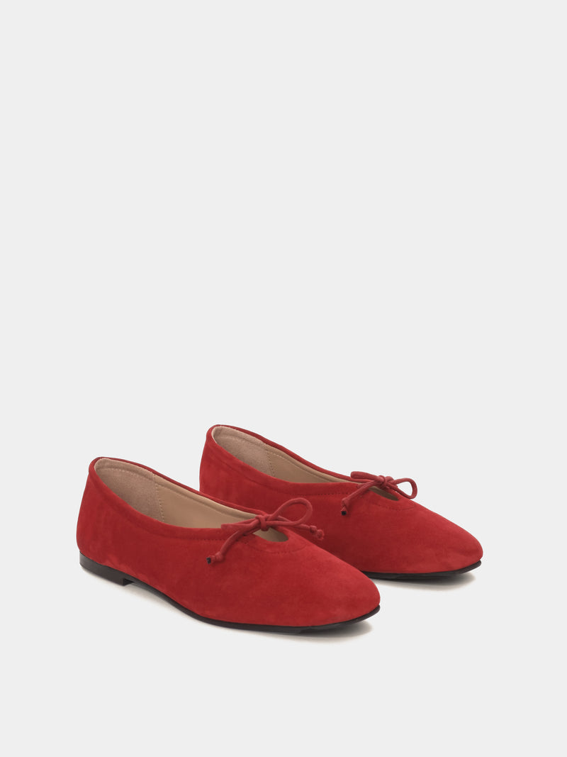Red suede leather ballerina flats with a red bow