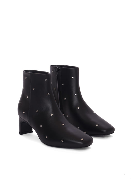 Black leather ankle boots with silver studs and a medium heel