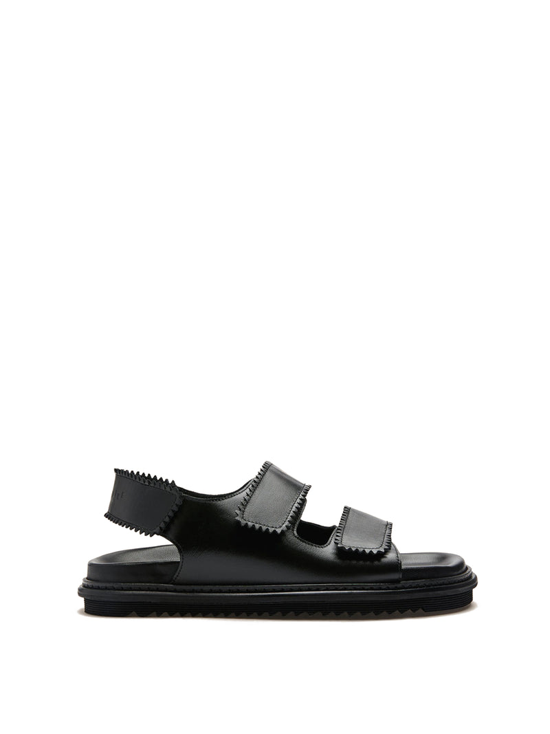 Tavira black leather sandal with two adjustable front straps and one back strap.