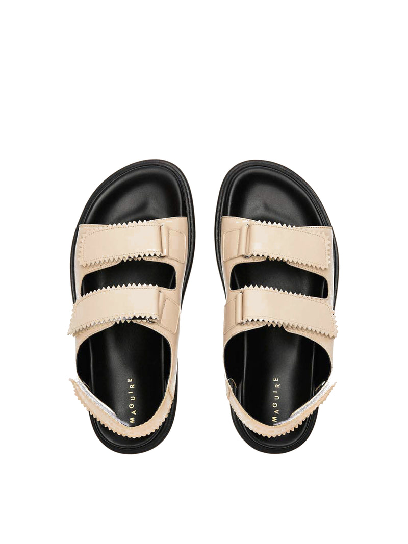 Tavira buttermilk leather sandal with two adjustable front straps and one back strap, top view.