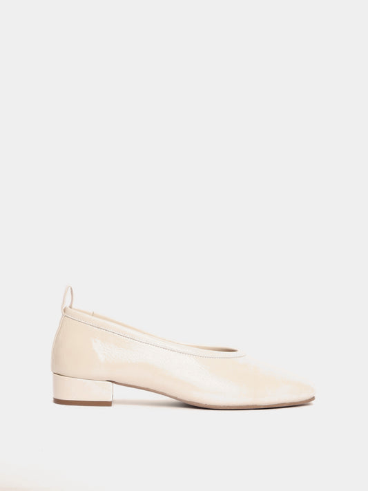 Cream patent leather ballerina pumps