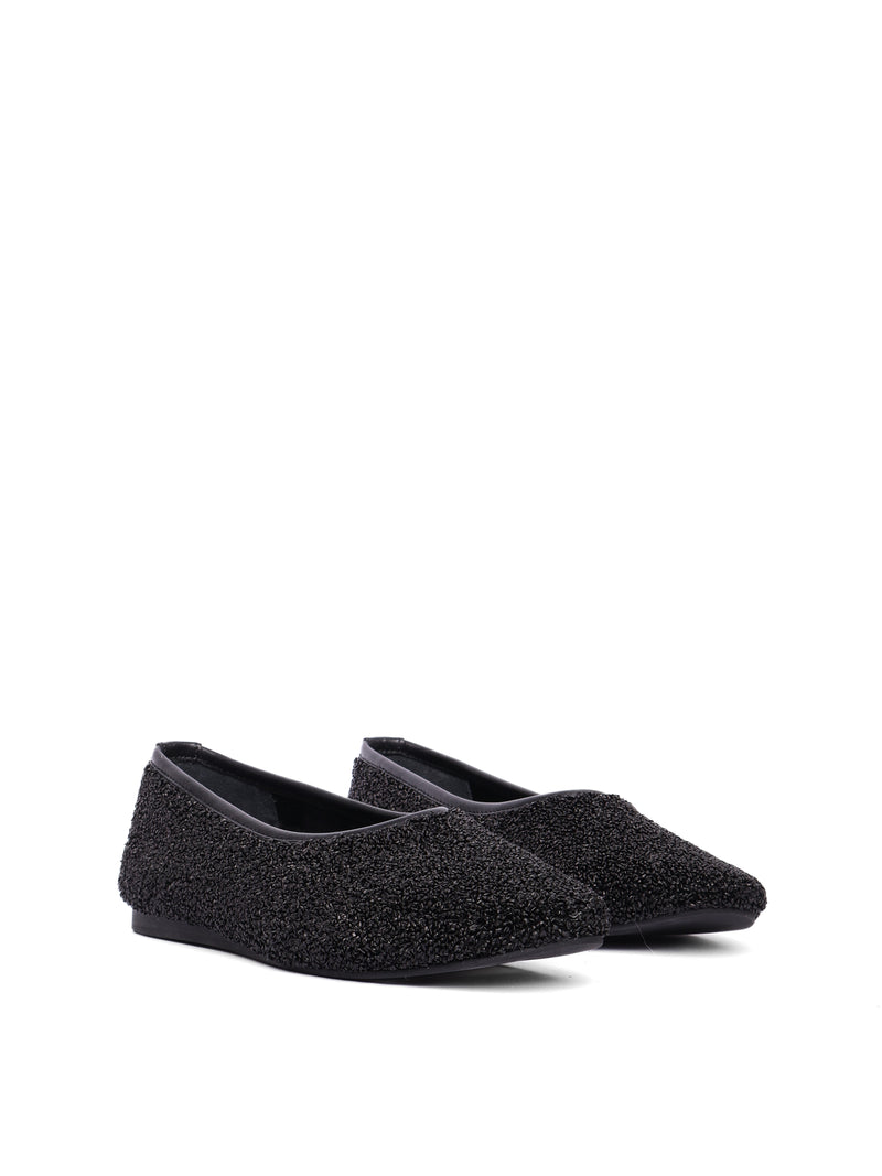 Ballerina flats made of black raffia