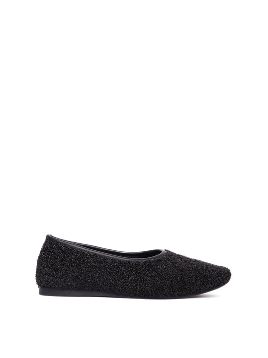 Ballerina flat made of black raffia