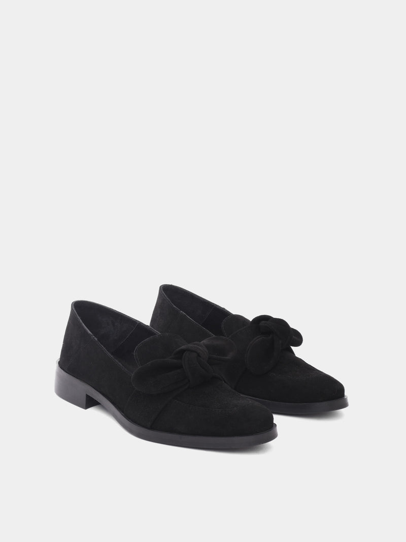 Black suede loafer with removable bow on upper