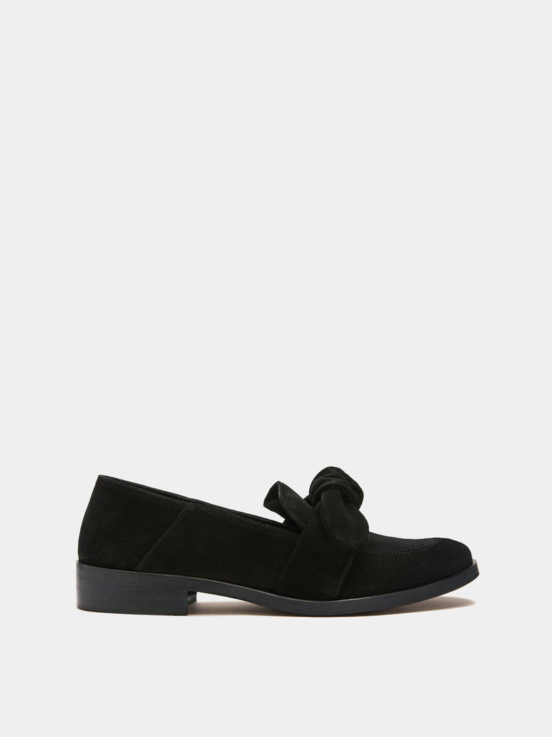 Black suede loafer with removable bow on upper