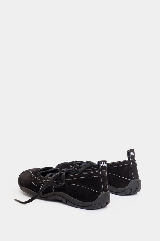 Black sneakers on a white background