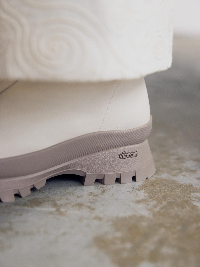 Close up on a taupe vibram outsole